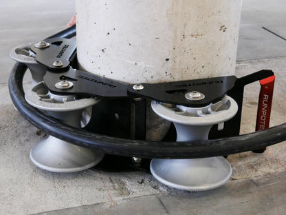 The Runpotec cable guide roller - 3 part - can be used for pulling cables gently around corners with the least possible resistance - example picture showing SWA cable running around a concrete post 